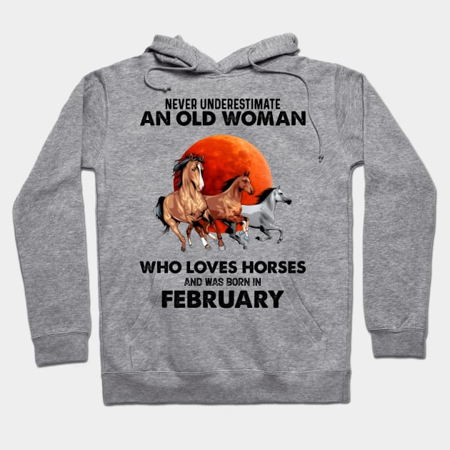 Never Underestimate An Old Woman Who Loves Horses And Was Born In February Hoodie by Gadsengarland.Art